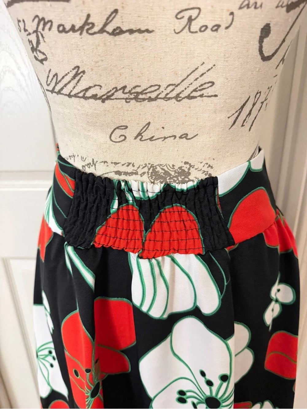 Anthropologie Black Midi Skirt with Red and White Floral Print
